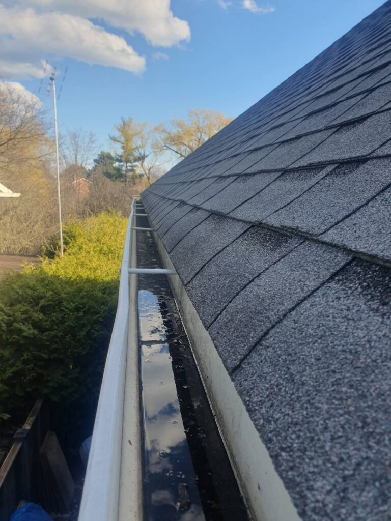 how to clean gutters after winter in Toronto
